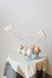 Kaboompics - Hen - shaped egg basket & glass egg holders