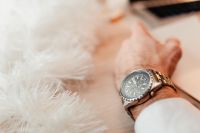 Kaboompics - Close-Up of a Man's Wristwatch with a White Fuzzy Sleeve