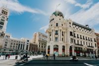 Kaboompics - Ornate Historic Corner Building and Gran Vía Street Traffic in Madrid