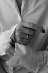 Kaboompics - Hands and White Shirt Sleeves in Monochrome