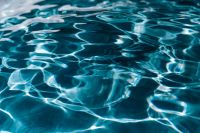 Kaboompics - Wavy water surface in a swimming pool