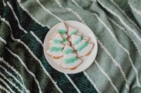Kaboompics - Christmas Tree Cookies on Green Knit Blanket