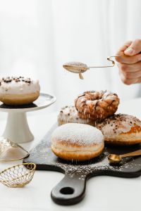 Kaboompics - Homemade Raspberry Polish Paczki Donut with Powdered Sugar
