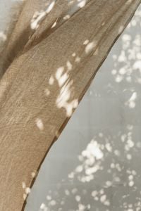 Kaboompics - Beige Linen Curtain Close-Up with Sunlight