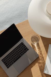 Kaboompics - Side View of Stone Lamp and Laptop on a Wood Desk