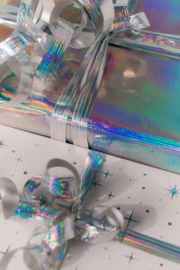 Kaboompics - White Star Print Gift Box with Holographic Ribbon