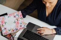 Kaboompics - Happy casual beautiful woman working on a laptop