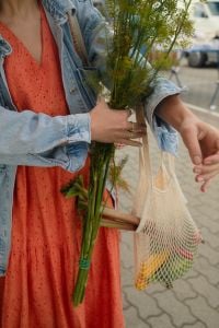 Kaboompics - Woman Carrying Fresh Dill and Rhubarb