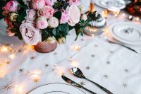 Kaboompics - Pink Flower Centerpiece with Plates, Cutlery and Fairy Lights