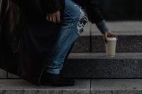 Kaboompics - Cropped Woman Sitting on Steps with Takeaway Coffee