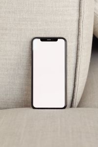 Kaboompics - Front-Facing Blank Phone Screen Mockup on Neutral Upholstery