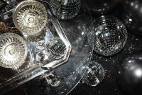 Kaboompics - Silver Balloons and Disco Balls Around Champagne Glasses
