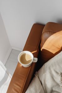 Cozy Coffee Break on a Leather Sofa for Home Decor and Lifestyle Content
