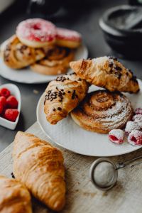 Kaboompics - Croissant and Raspberry Pastry Platter with a Sugar Sieve