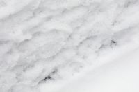 Kaboompics - Diagonal Snow Ridges with Fine Crystals, Pale Abstract Winter Texture