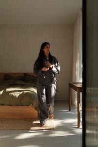 Kaboompics - Walking through a Sunlit Bedroom with a Green Smoothie