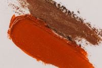 Kaboompics - Orange Lipstick and Brown Powder Swatches