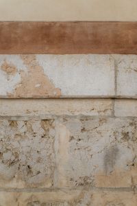 Kaboompics - Layered Stone and Plaster Wall Background