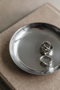 Kaboompics - Chrome Rings in Reflective Metal Bowl