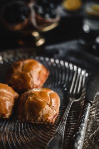 Kaboompics - Close-Cropped Sweet Buns with Vintage Silver Cutlery