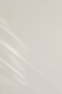 Kaboompics - Faint Diagonal Sunlight on Warm White Wall