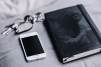 Kaboompics - iPhone, Moleskin notebook, keys