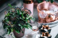 Kaboompics - Green Berry Centerpiece with Glassware and Gift Boxes