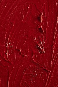 Kaboompics - Red Lipstick Texture with Glitter Accents