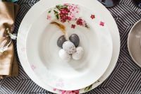 Kaboompics - Round dinner table decorated with easter motifs