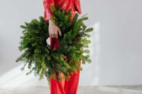 Kaboompics - Woman in Red Sequin Outfit with Christmas Wreath