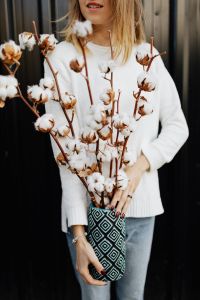 Kaboompics - Woman holding a cotton flower