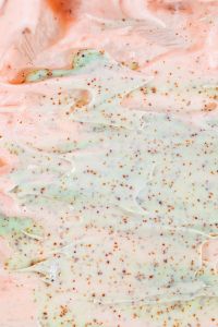 Kaboompics - Pastel Skincare Cream and Exfoliating Scrub Swirls, Macro Beauty Texture Background