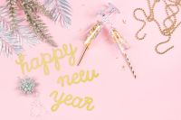 Kaboompics - Happy New Year Pink Background with Festive Gold Decor