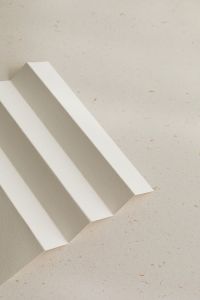 Kaboompics - White Folded Paper Strips on Speckled Surface