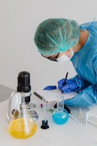 Kaboompics - Overhead View of Scientist Working in School Laboratory