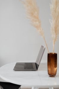 Kaboompics - MacBook Pro 15 laptop and iPhone 11 Pro on a marble table
