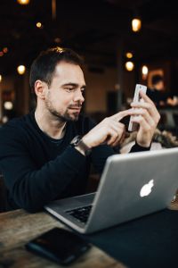 Kaboompics - Young man using mobile phone
