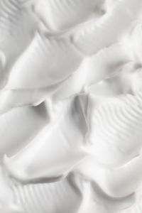 Kaboompics - Sculpted White Cream Peaks and Soft Valleys, Glossy Skincare Macro Background