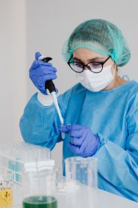 Kaboompics - Science Demonstration Using a Pipette at Laboratory Bench
