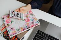 Kaboompics - Happy casual beautiful woman working on a laptop & mobile phone