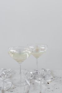 Kaboompics - Two Champagne Glasses in a Minimal Celebration Background