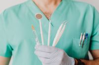 Kaboompics - Syringe and Dental Mirror in Clinical Close-Up