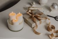 Kaboompics - Gift Wrapping Supplies with Candles and Ribbon