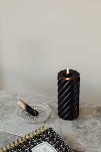 Kaboompics - Black candle - palo santo - marble table
