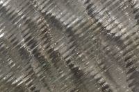 Kaboompics - Dark Linear Glass Texture with Diagonal Reflective Ridges