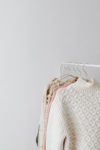 Neutral Knitwear Capsule Wardrobe With Cozy Sweaters and Copy Space