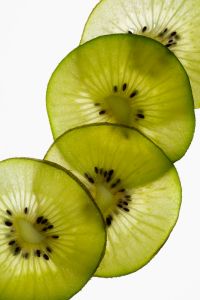 Kaboompics - Overlapping Kiwi Slices in Backlight
