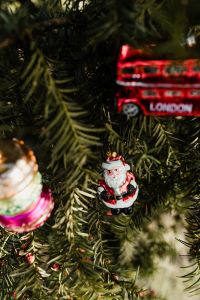 Kaboompics - Red Bus, Macaron and Santa Decorations on Christmas Tree