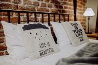 Kaboompics - Enjoying evening with a Macbook in a nice bed