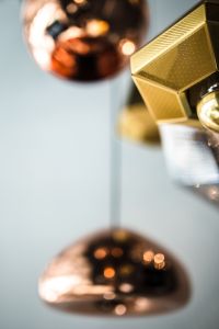 Kaboompics - Gold Geometric Pendant Light with Copper Bokeh